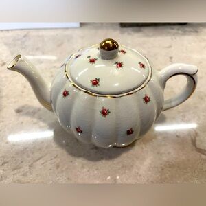 Gibson, Staffordshire England, teapot. Pumpkin shape, gold trim and petite roses